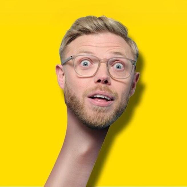 Rob Beckett's head with an extremely long neck on a yellow background.