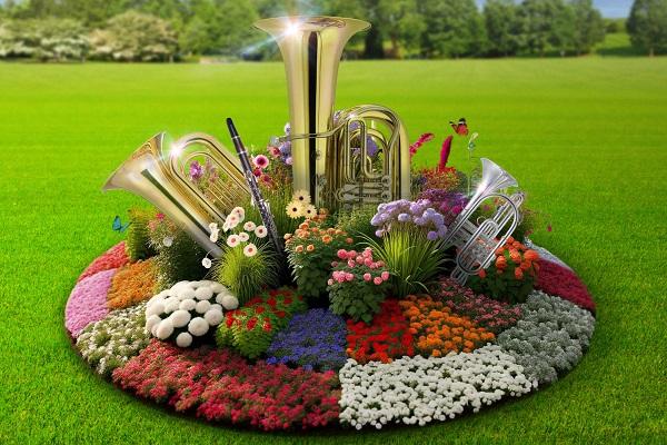 A colourful flowerbed with instruments coming out. 