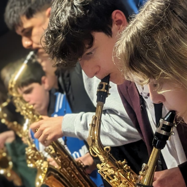 students playing alto saxophones