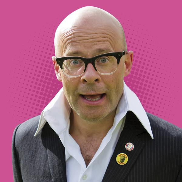 Image of Harry Hill in his classic suit and white casual shirt combo against a pink background.