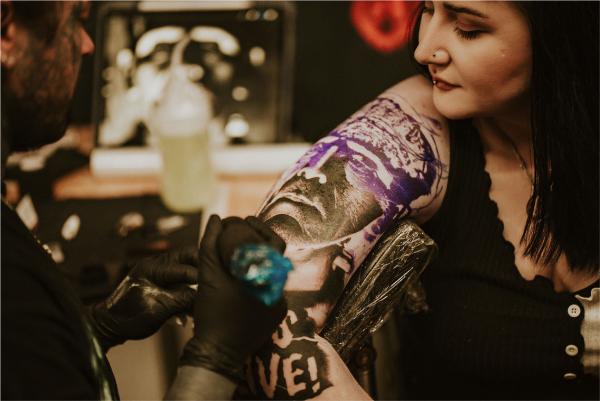 Kyle Williams tattooing a portrait of Frankenstein at Leeds Tattoo Expo 2023