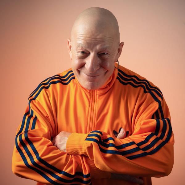 Jeff Innocent in an orange tracksuit