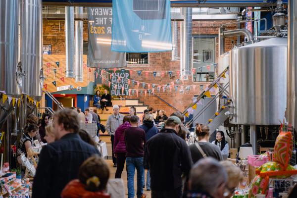 The Mindful Market in full swing, shoppers are browsing stalls in North Brewing Co's Springwell Brewery and Tap Room