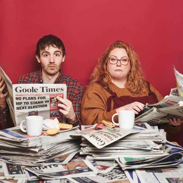 Ian Smith & Amy Gledhill reading newspapers