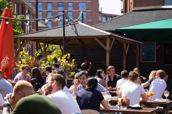 Water Lane Boat House beer garden full with people on a summers day