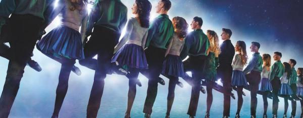 A promotional image for Riverdance featuring a line of dancers.