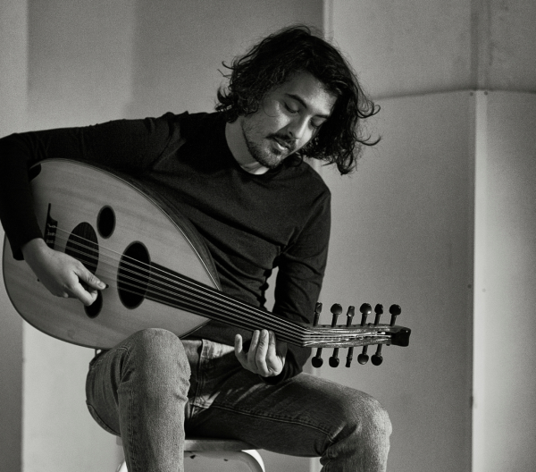 Abderraouf Ouertani plays the oud - an Arabic stringed instrument similar to a European lute.