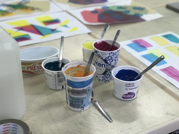 Image shows 5 yoghurt pots filled with different ink colours.