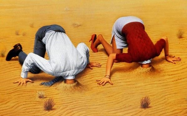 The 2 main characters with their heads in the sand