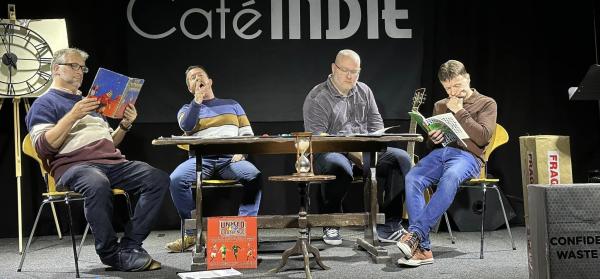 Four ordinary men, doing ordinary things,  reading poetry and waiting for the revolution to begin.