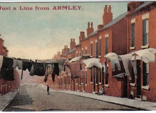 Postcard showing washing line in Armley back to backs