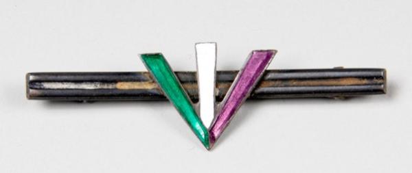 metal and enamelled bar badge with design of portcullis & Suffragette broad arrow in purple, green  and white