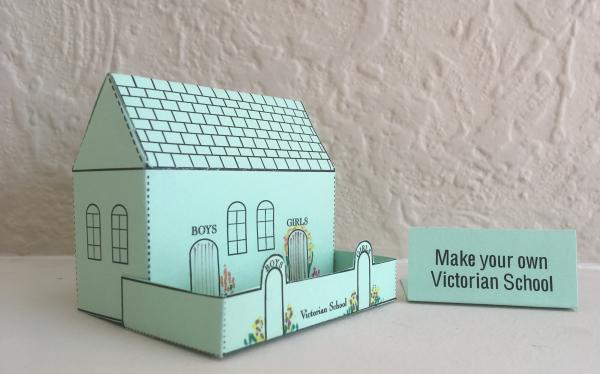 A miniture victoria school crafted in card.