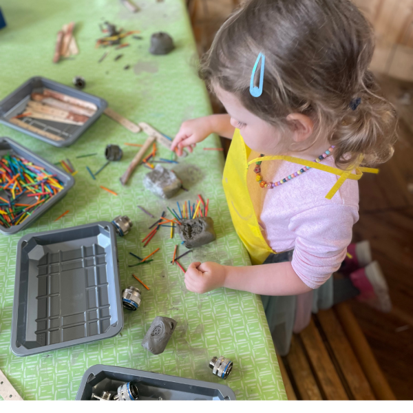 a child playing with scrap