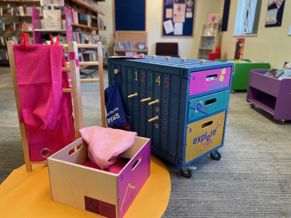 The Mini Playbox in this image reflected the shipping containers used by Playful Anywhere to bring Play and Connectivity to Communities Anywhere. These wheel out miniature shipping containers, include six drawers of activities for 0-5’s. Each drawer pulls out to become a floor or table based activity for adults and children to engage in together. Drawers and activities are colour coded for easy tidy up.