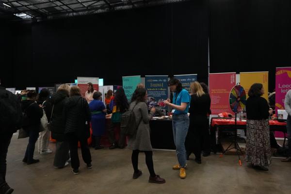 Exhibitors and visitors talking at last years event