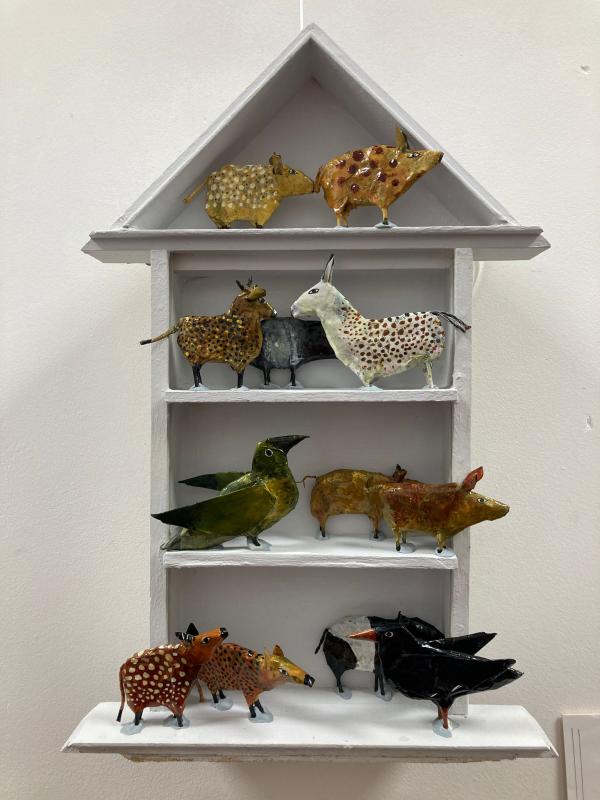 Paper animals in a small house