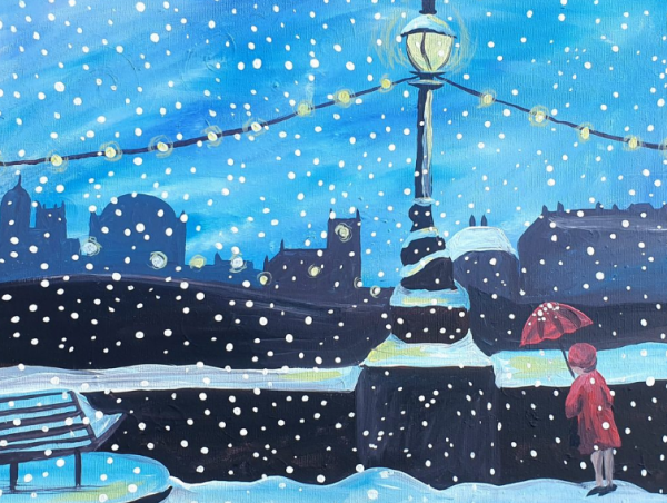 A small girl wearing all red with a red umbrella stands to the right of a snowy image. The snow is falling across the sky. An old style lamppost shines and is an anchor for the bright coloured lights that hang across the image. A silhouette image of a skyline sits in the background of the image while a bench covered in snow sits to the left. a light is on in the church shaped building to the back of the image and to the right of the image a snow covers one of the buildings in the back.