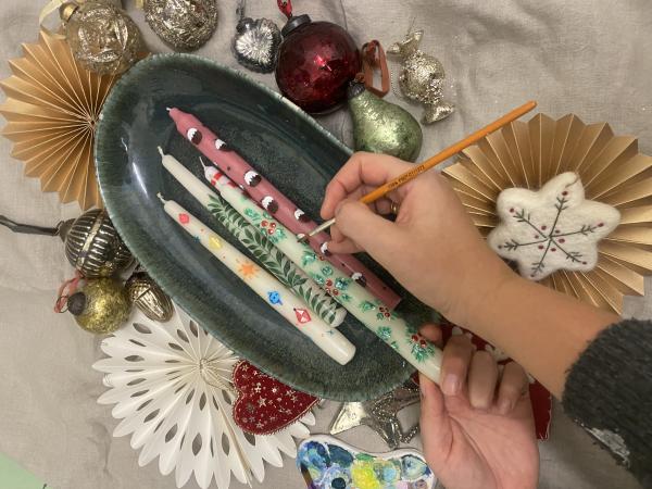 Image of examples of festive candles you can paint