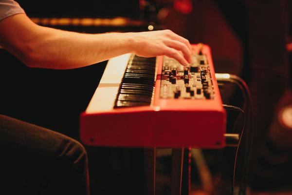 Person playing a keyboard