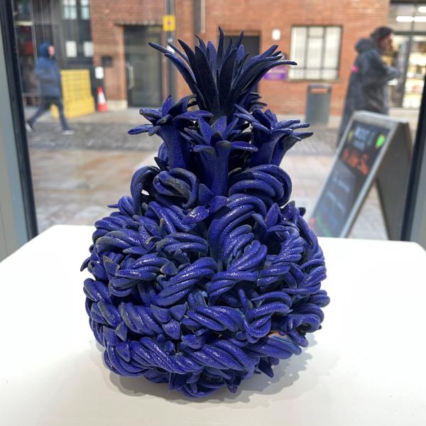 Terracotta Earthenware with Cobalt Blue Glaze of a plant in bloom