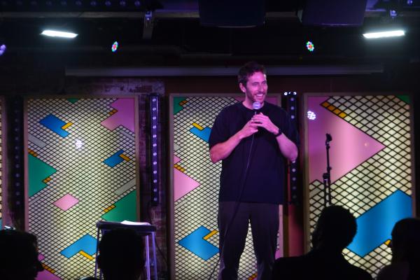 Comedian performing.