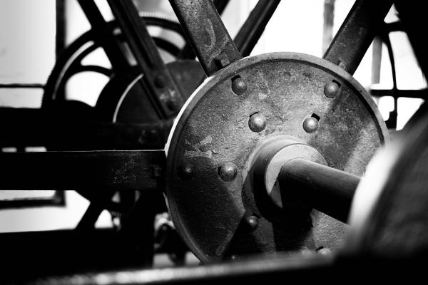 Black and white image of an industrial era metal mill