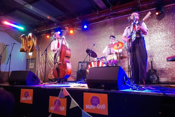 Image of swing band playing on the stage at a Made with Music mini-gig