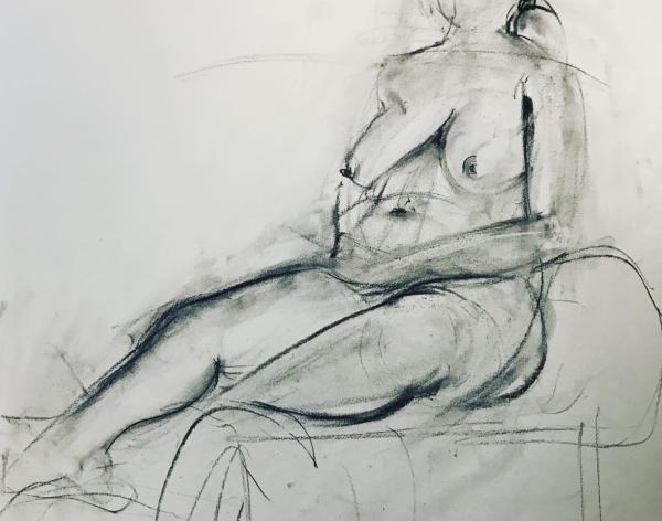 Charcoal sketch of seated model.