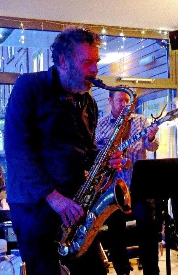 John Taylor playing saxophone