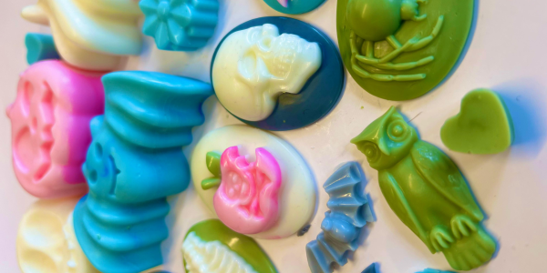 image of wax melts in different coloured spooky shapes