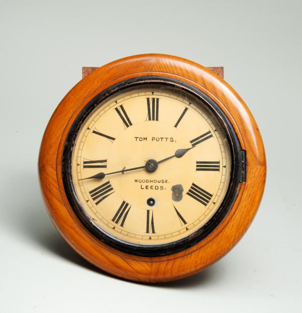 Wall clock made by Potts of Leeds.