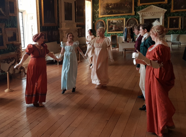 Historic dancers in the Picture Gallery at Temple Newsam