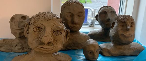 6 clay head sculptures