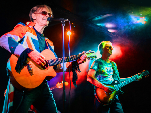 MoonAge performing on stage.