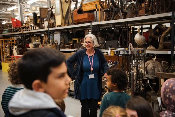 A curator with a tour group in Leeds Discovery Centre's Collection Store