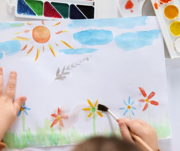 Child painting flowers