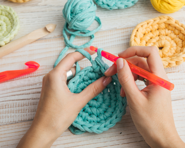 Hands crocheting 