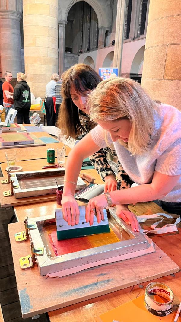 Two people Screen Printing