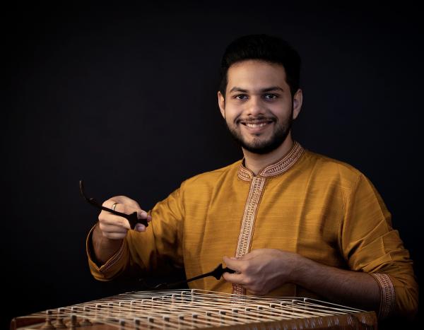 Man playing Santoor