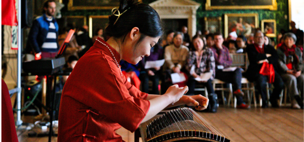 A girl playing a Guzheng