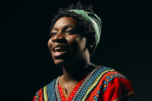 An image of a woman singing. 