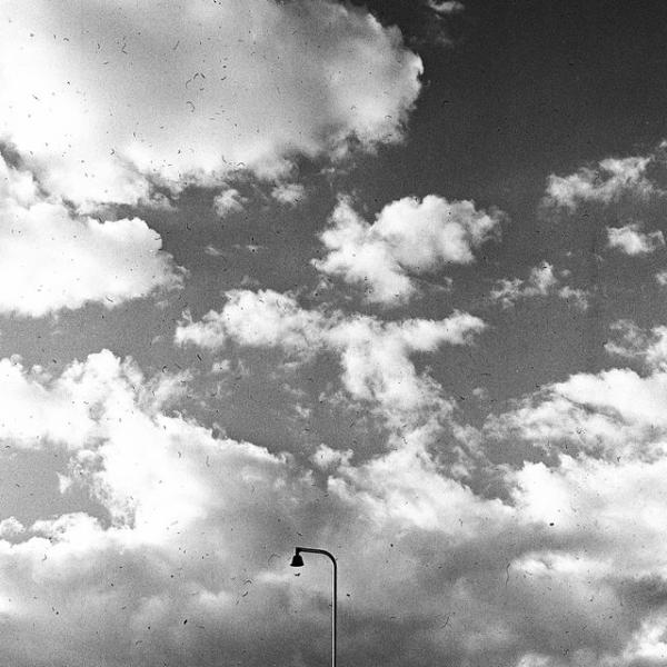 a cloudy sky in black and white