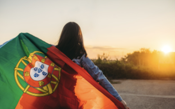 Lady holding Portuguese flag