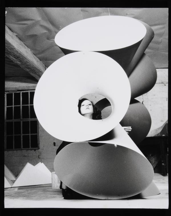 Models posing with Neville Boden Sculpture