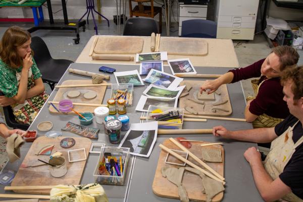 Pyramid member artists designing clay artworks inspired by John Atkinson Grimshaw artwork