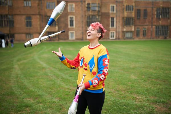 Someone juggling outside Temple Newsam 