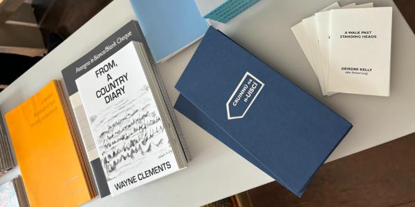 A set of artists' books on a table
