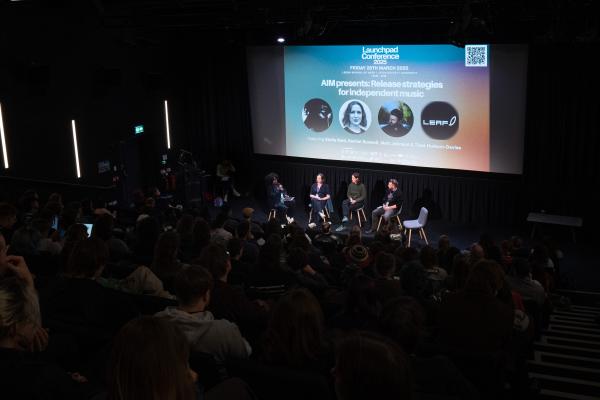 Launchpad Conference panel taking place with a selection of speakers. 