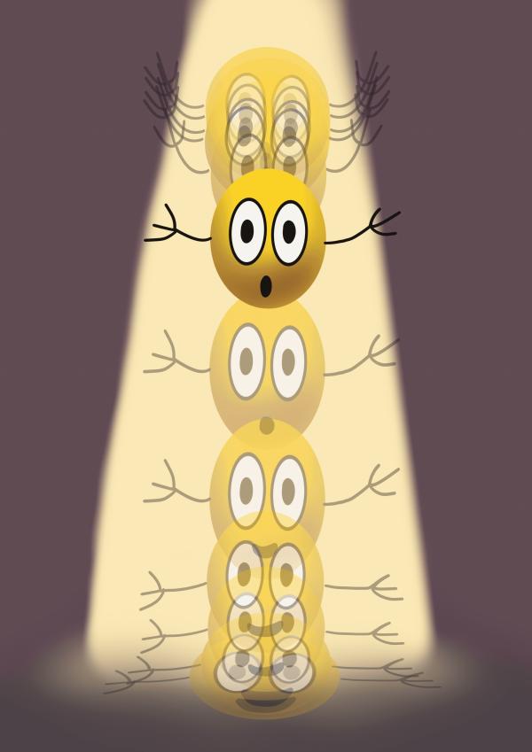 Still from stop motion animation: featuring a bouncing ball with a face on. The ball has arms and legs and is bouncing up and down in a spotlight 